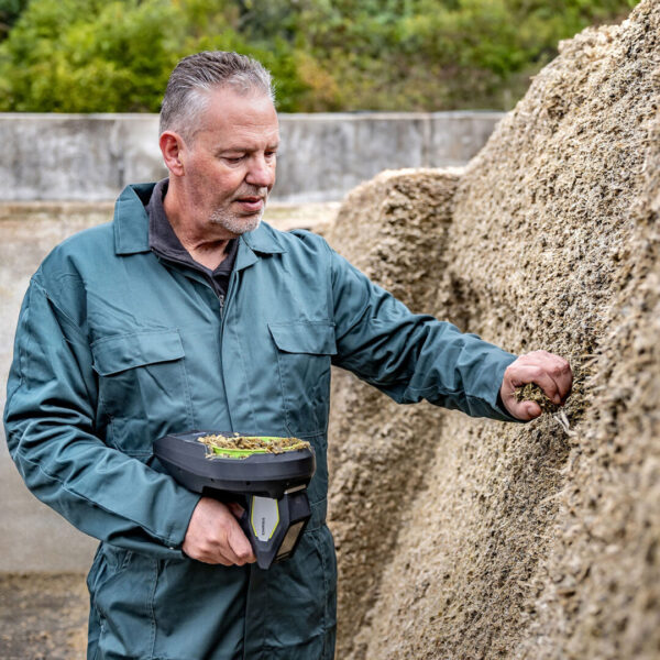 On Farm Solutions_silage sample taking by farmer SQUARE
